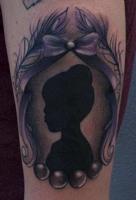 Ryan Mullins - silhouette of girl tattoo
